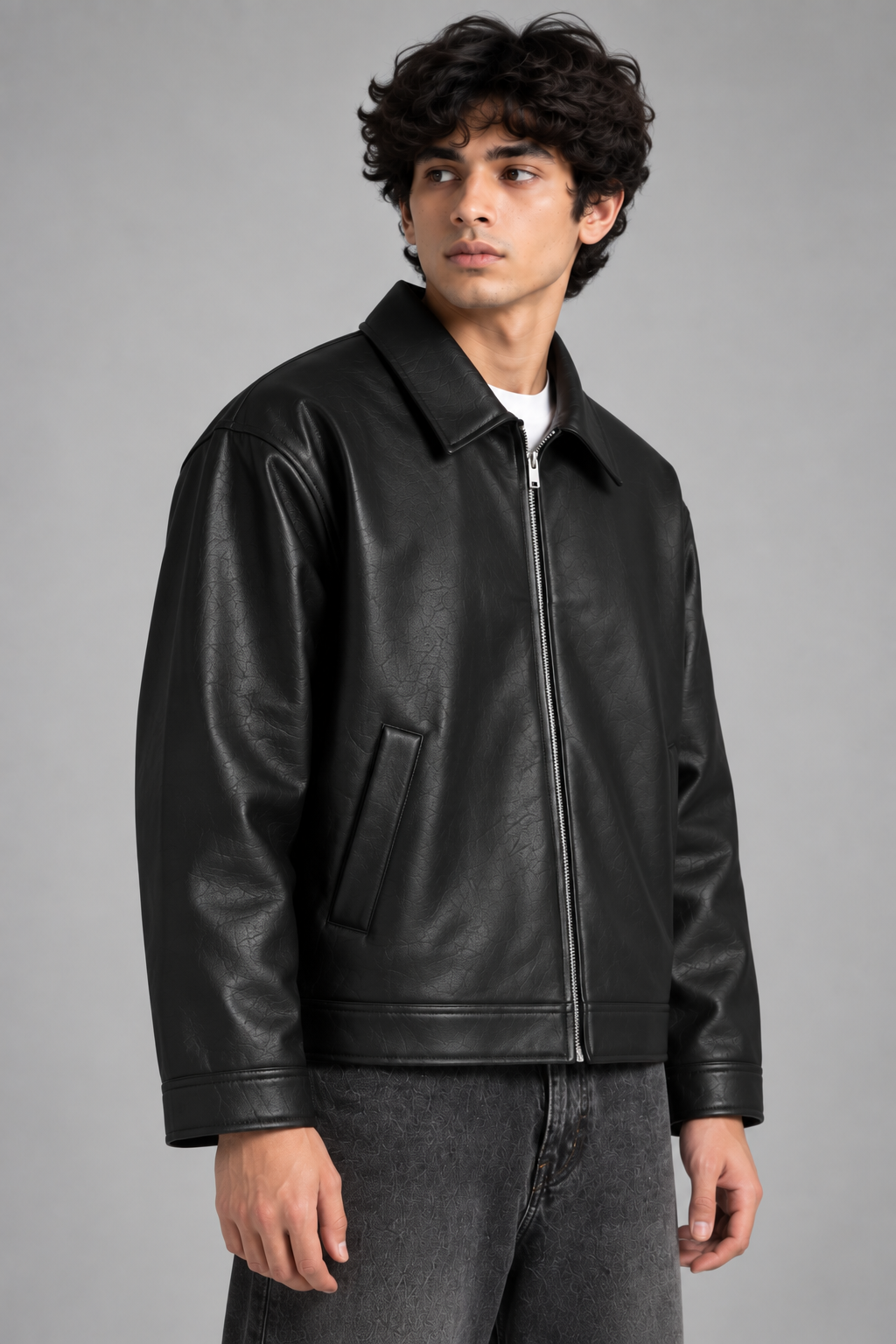 Men's black faux leather jacket by XOVRA designed for premium streetwear and modern urban fashion.