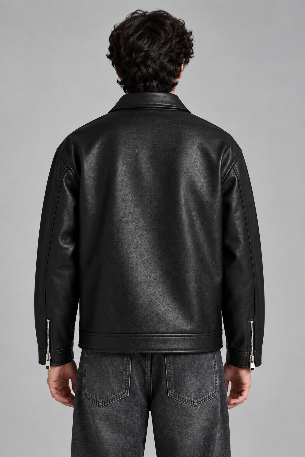 Premium black faux leather jacket with detailed zipper design for a bold streetwear look by XOVRA.