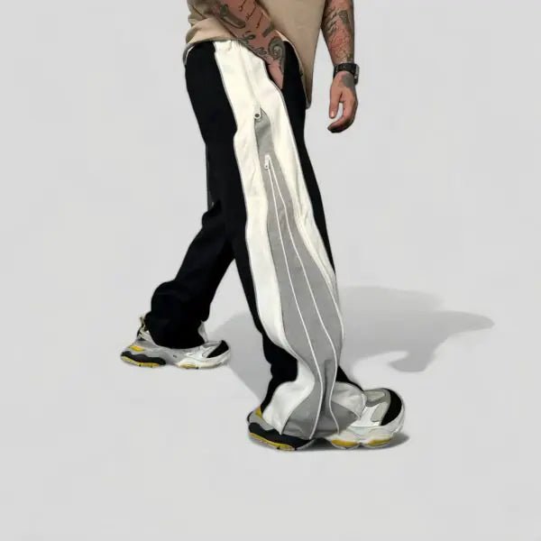 Side view of XOVRA Dual Zip Black and Grey Track Pants – Premium Streetwear Joggers