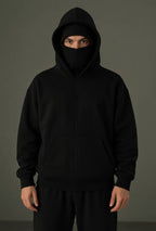 Front view of XOVRA Balaclava Zipper Hoodie – matte black oversized techwear hoodie