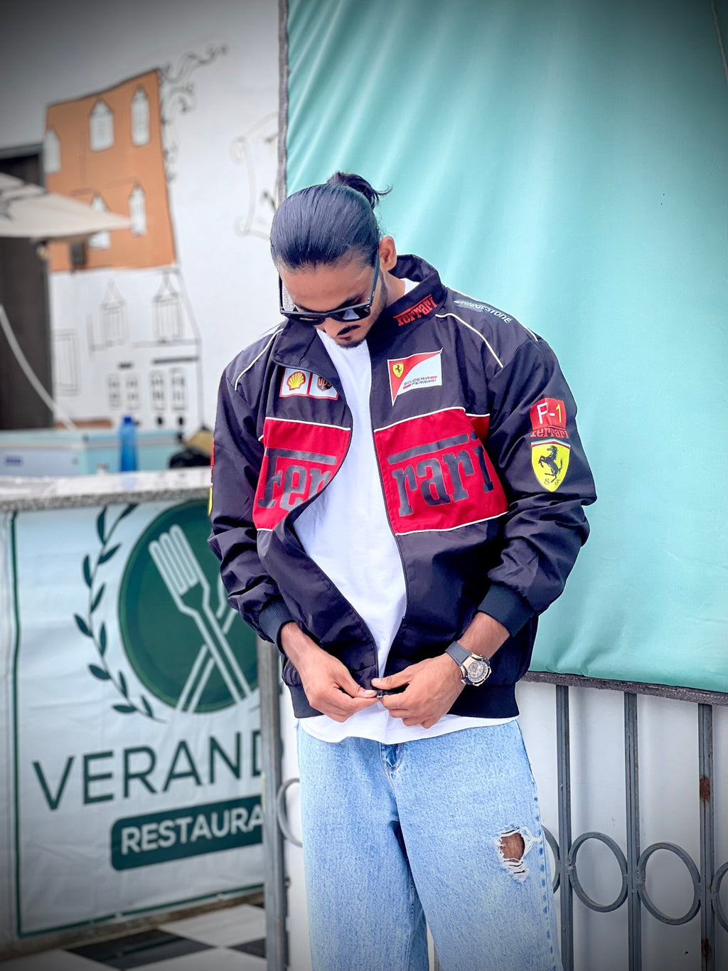 Black Ferrari racing jacket on Indian model side profile – XOVRA clothing brand